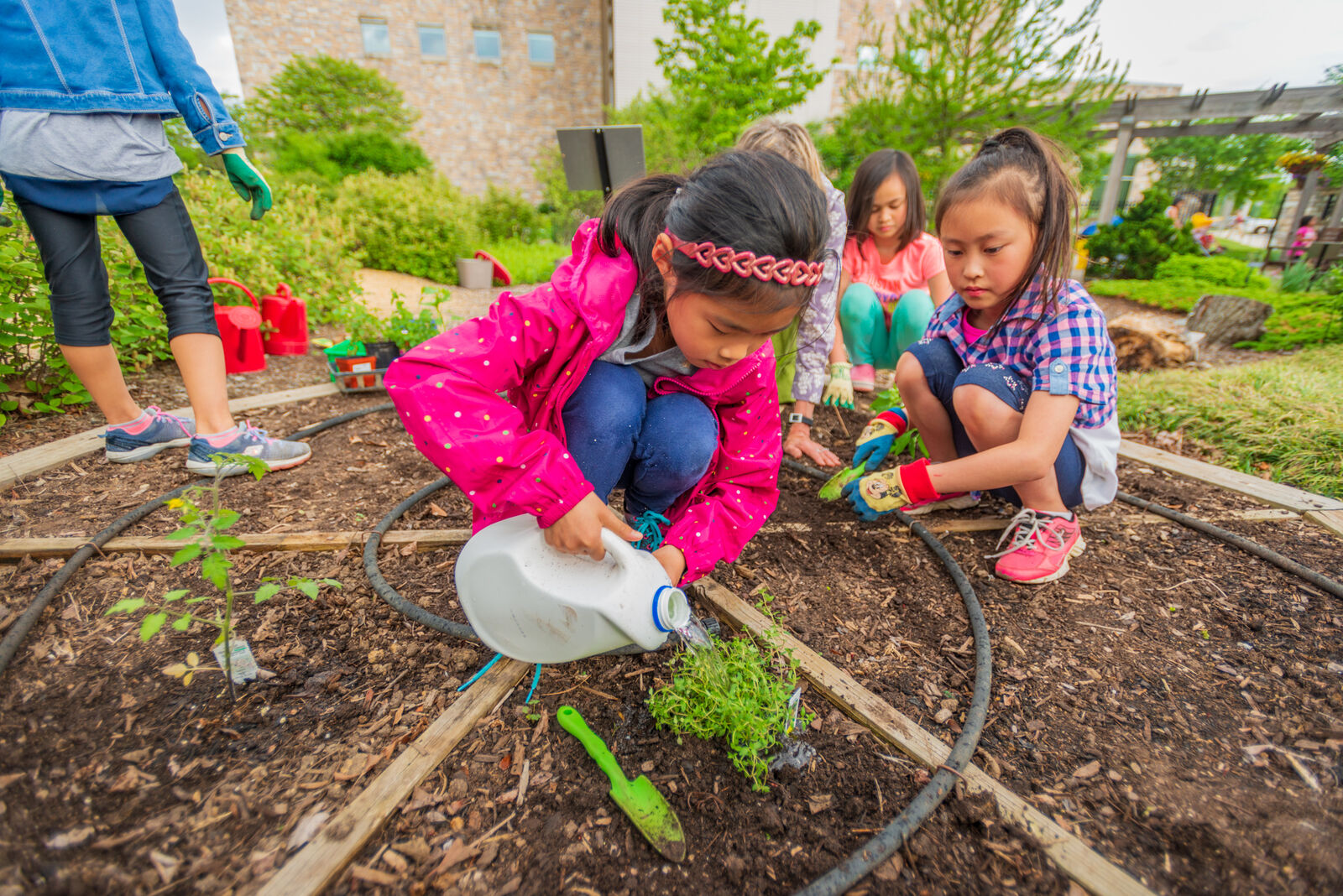The Tween Sprouts Enchanted Garden Club plants a pizza garden.
